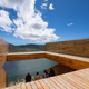 Illustration for article titled This High-Altitude Overlook Perfectly Frames a Volcano